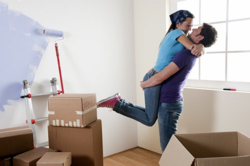 Packed moving boxes and furniture for a local relocation