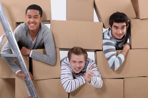 Packed boxes and furniture ready for loading during a Coulsdon move