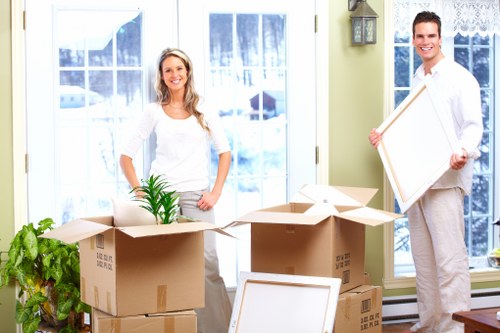 Moving boxes and furniture with a Coulsdon van service