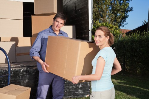 Professional removals team handling furniture and boxes in Coulsdon
